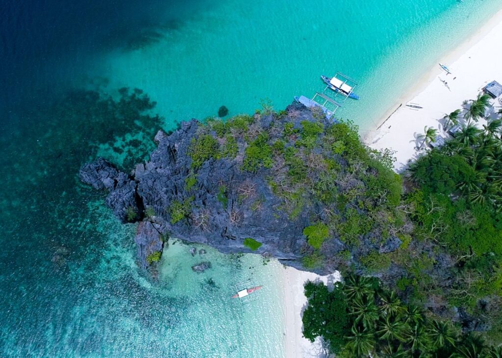 Aerial view of Palawan water and limestone cliffs