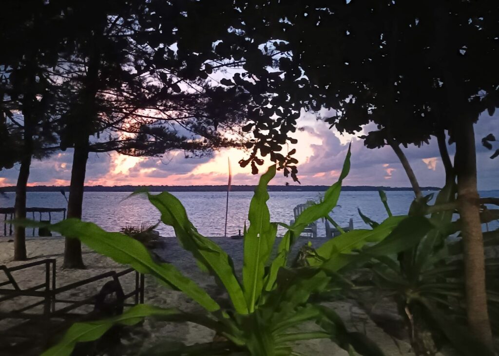 Sunset on Balabac Islands with greenery and ocean