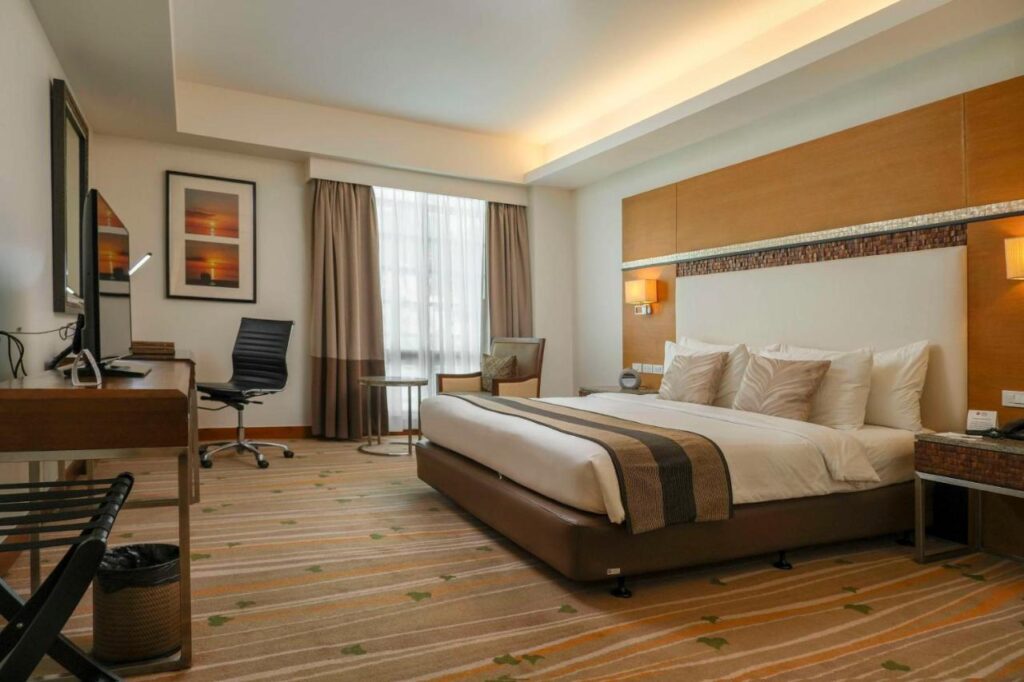 bedroom at Best Western Plus The Ivywall Hotel in Palawan