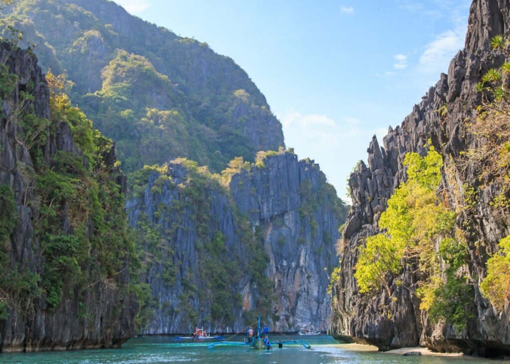 Big Lagoon on El Nido with boats between the limestone karsts