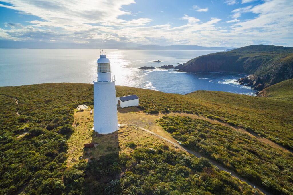 Aerial view of Bruny Island Lighthouse at sunset, Tasmania.
