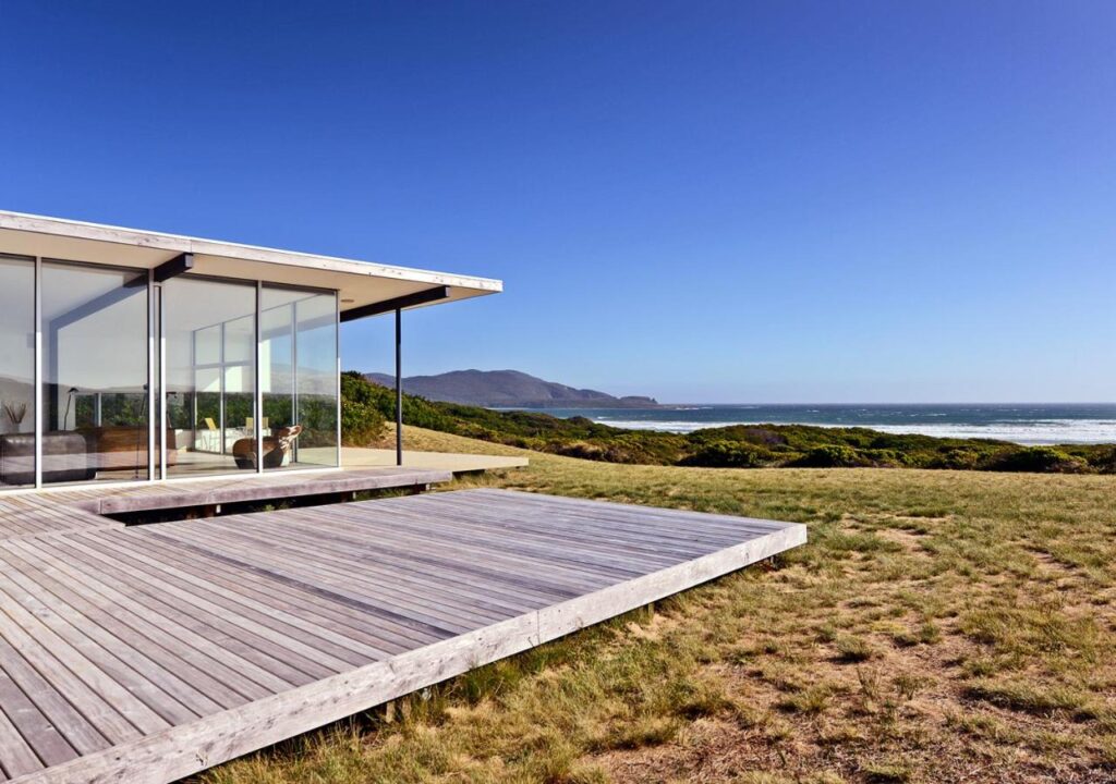 glass walls house facing a beautiful ocean view at Bruny Island