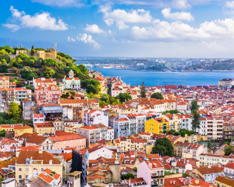 Lisbon, Portugal town skyline in a sunny day.