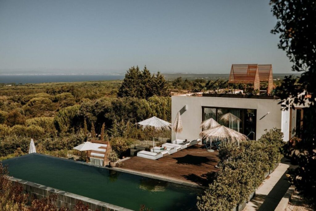 view of Eco-Lodge Villa Epicurea with outdoor pool and a balcony