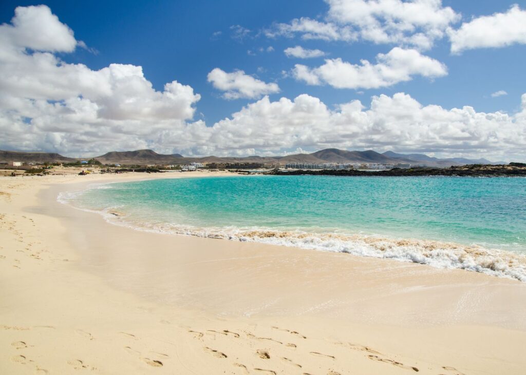 white beach sands and blue waters at El Cotillo Beach