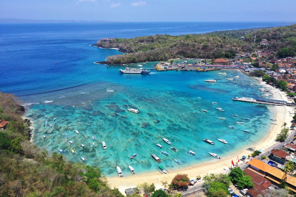 aerial view of boats getting from Bali to the Gili Islands in Padang Bay Port