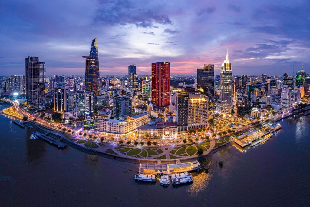 Ho Chi Minh City skyline at night along the Saigon River