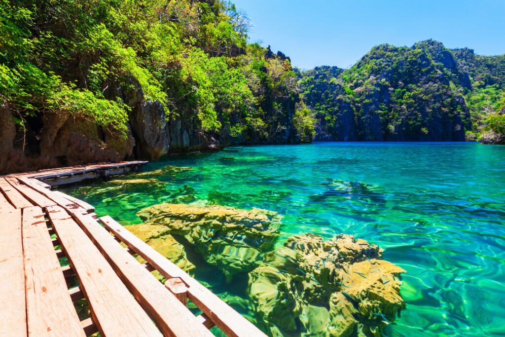 Kayangan Lake in Coron with boardwalk and lush greenery
