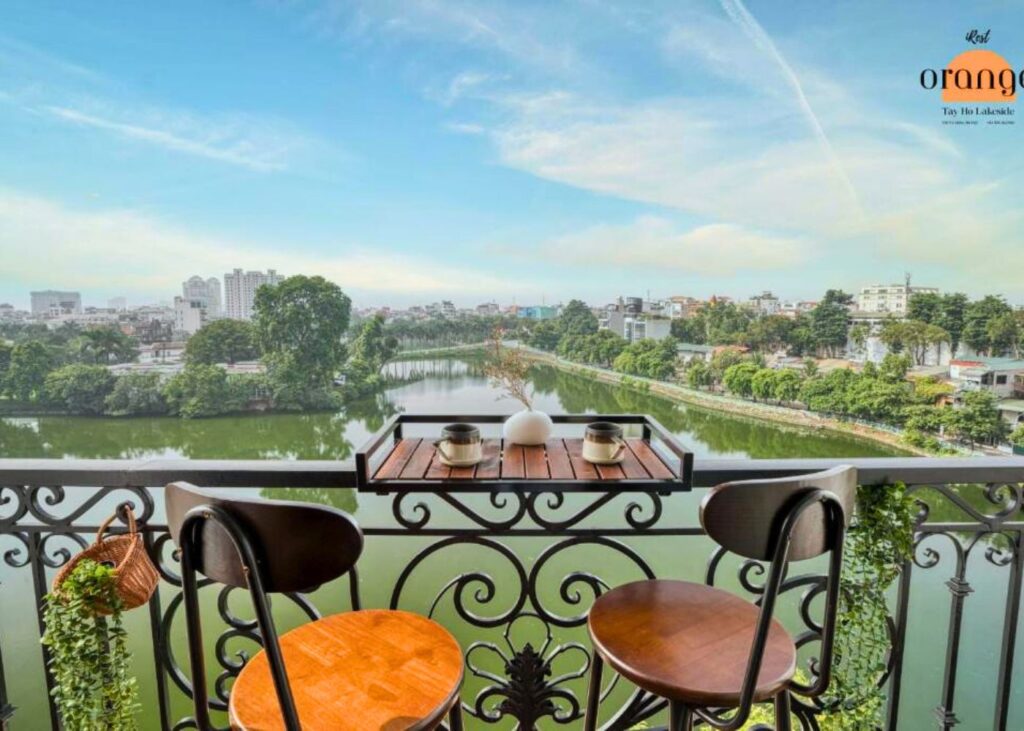 lake view and seating from balcony at iRest Orange Tay Hotel in Hanoi