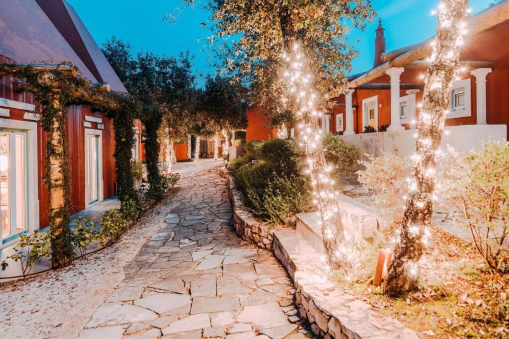 cobble stone pathway with yellow lights