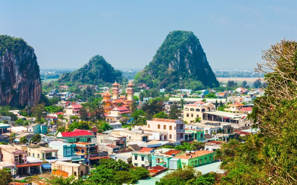 Marble Mountains, against a blue sky, one of the top spots on a Da Nang Itinerary