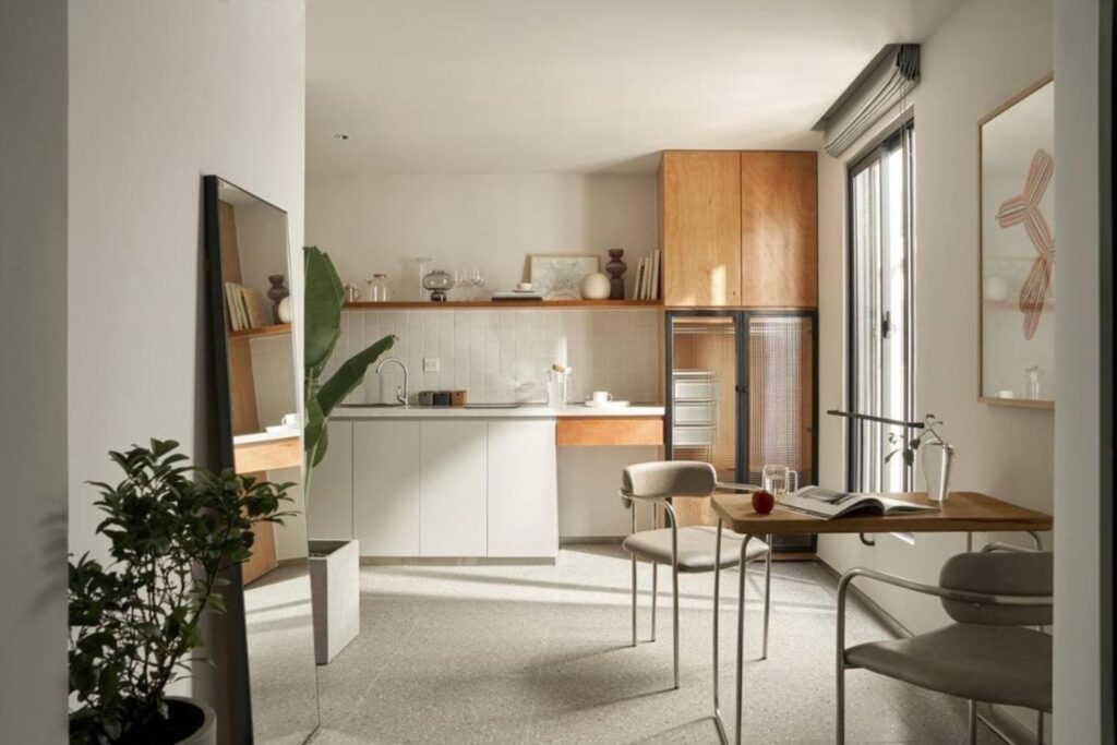 Modern and minimal apartment in white and neutrals at the M Village the Boutique