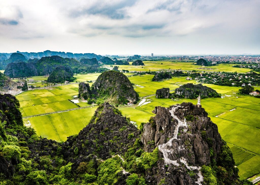 Ninh Binh landscape from above with limestone karsts and temples