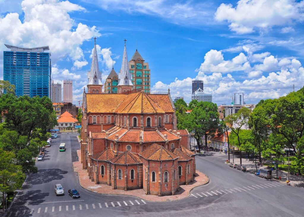 Notre Dame Cathedral Ho Chi Minh against a blue sky with clouds