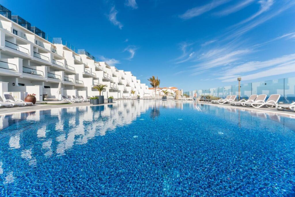 elegant hotel with spacious terraces and balconies and a large ininity pool