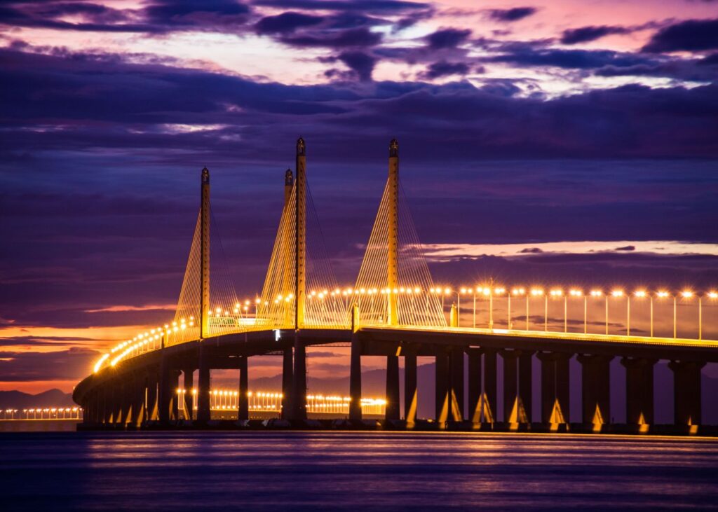 Penang Bridge at sunset with night lights on