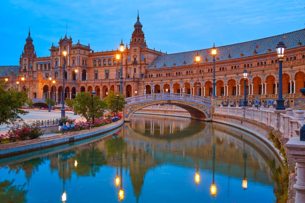 panoramic view of Plaza de España, Seville in front of a canal