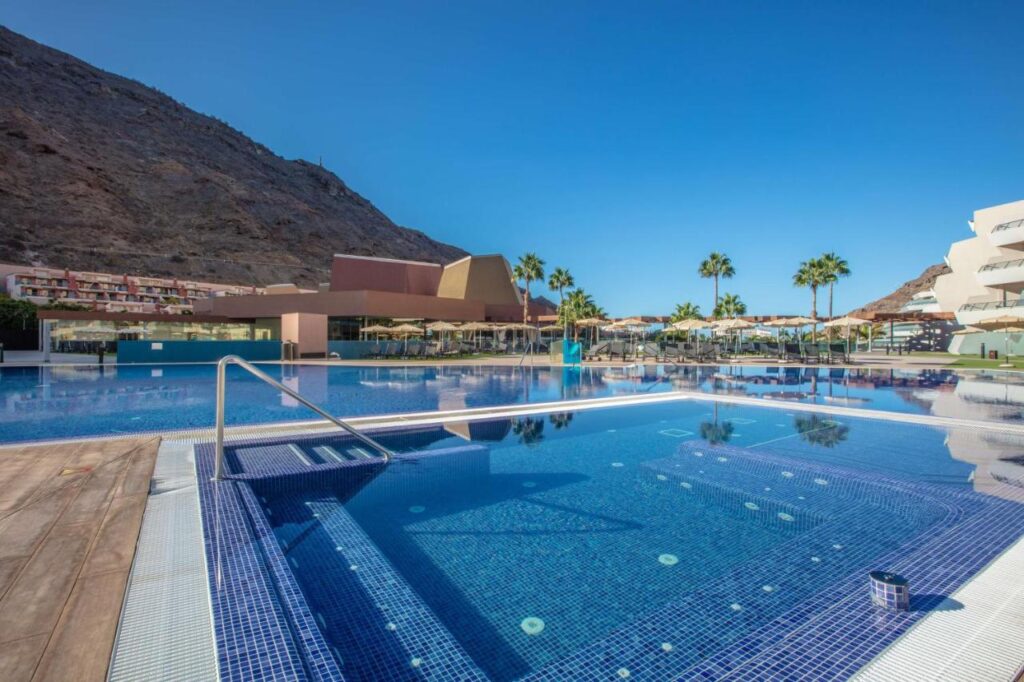 large outdoor pool with gorgeous mountain views