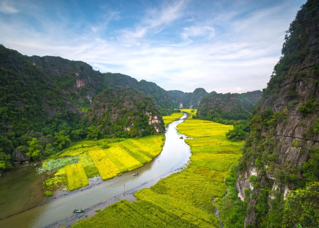 River cutting through Ninh Binh with mountains and greenery