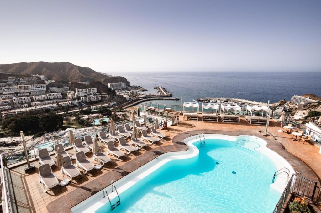 view from the top of the terrace and a rooftop pool