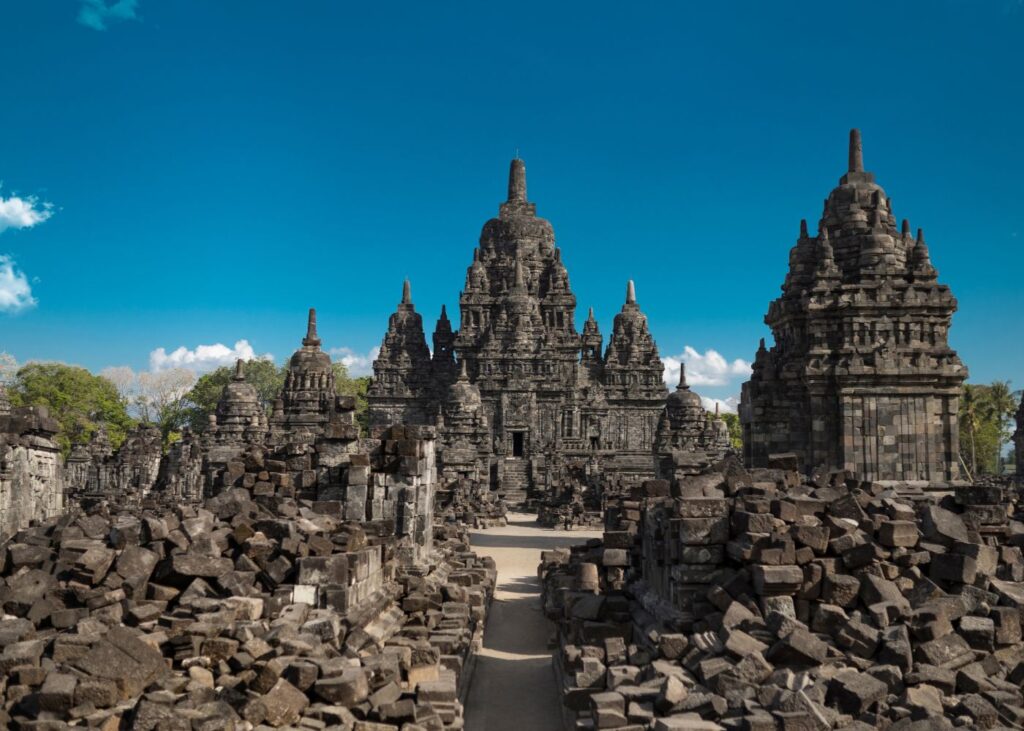 beautiful architectural design and old rocks of the Sewu Temple with a blue sky background