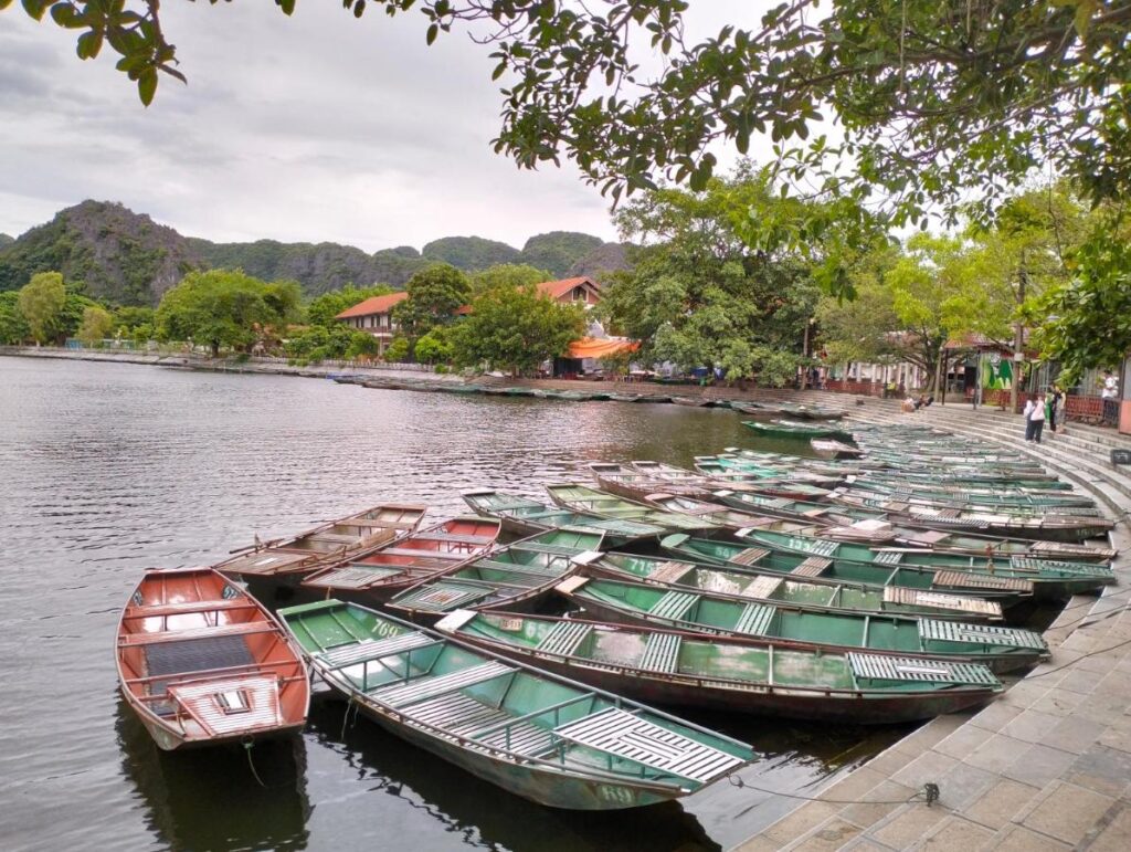 traditional boats docked in the river