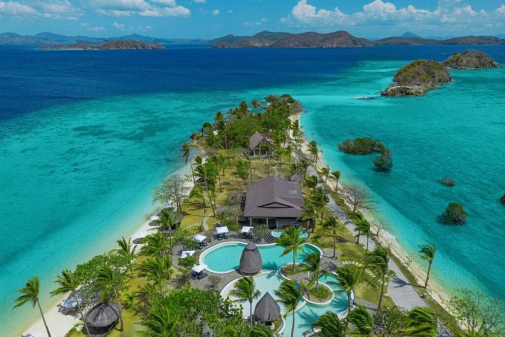 aerial view of the pool and the surrounding beach of Two Seasons Coron Island Resort
