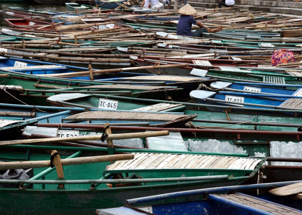 Wooden boats ready for boat rides in Ninh Binh